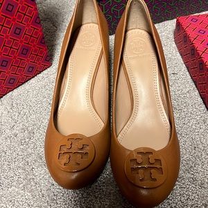 Tory Burch tan wedge in a size 7.5
